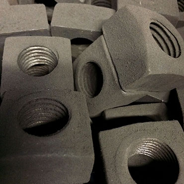 Close up of Antique Square Nuts Produced By Columbia Machine in Early Mid 1900s.jpg